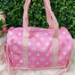 White star on pink Small duffle bag with strap.